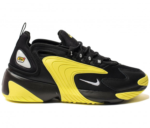 nike yellow and black sneakers