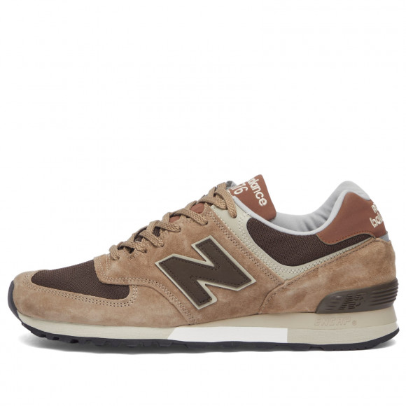 New balance hombre beige best sale